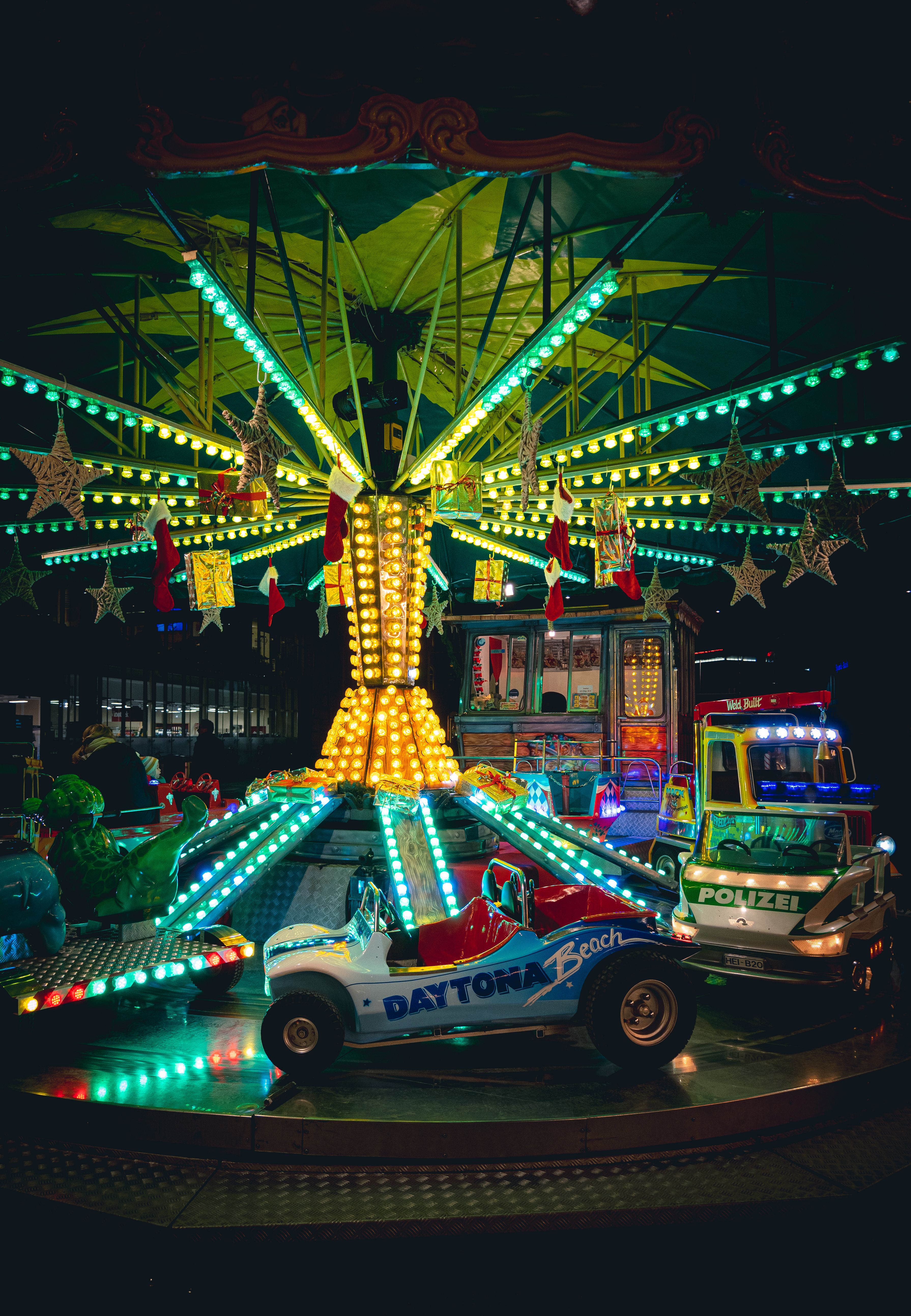 Colorful Nighttime Christmas Carnival Ride · Free Stock Photo