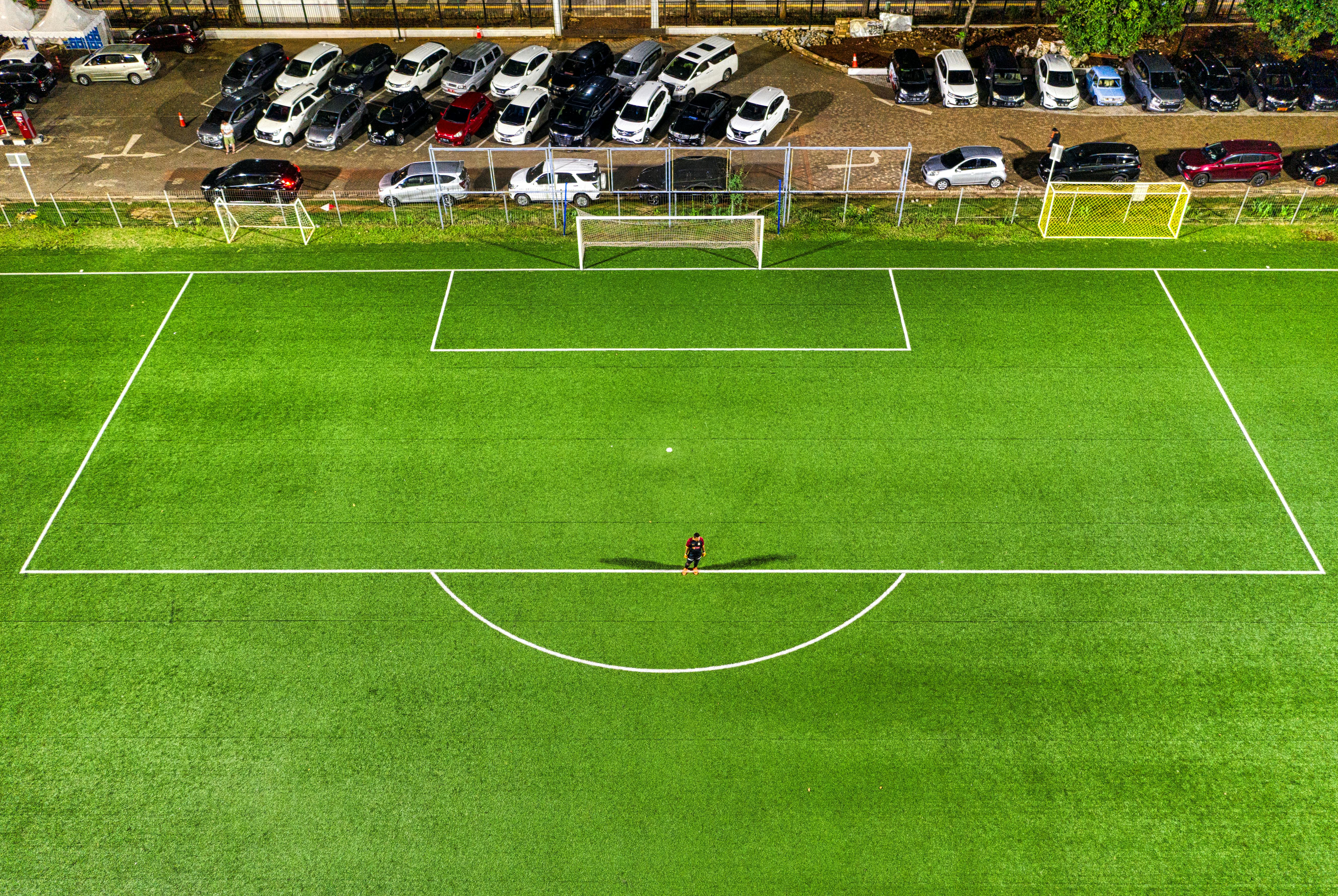 aerial photography of football field goal net