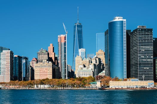 Free stock photo of big city view, blue sky cityscape, city skyline reflection