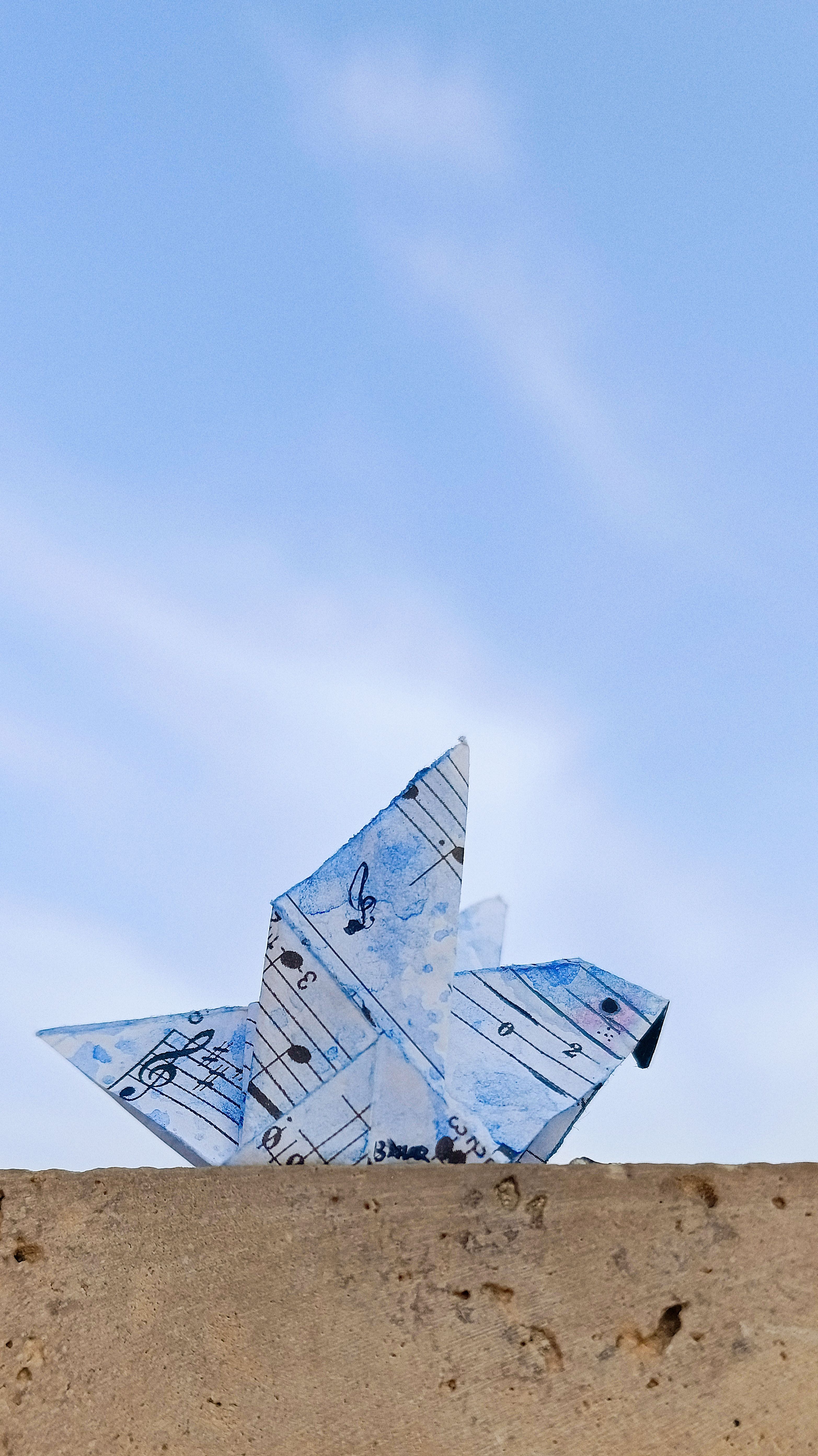 Creative Origami Against a Clear Sky · Free Stock Photo