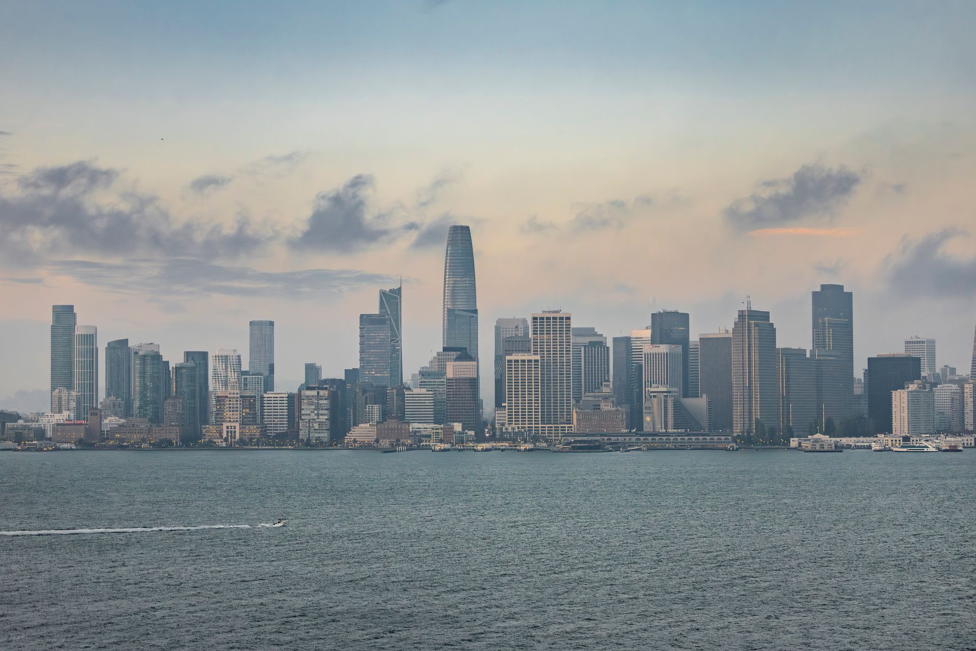 San Francisco skyline with bay and financial district at dusk.