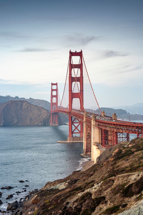 Free Stunning view of the Golden Gate Bridge spanning the serene San Francisco Bay. Stock Photo
