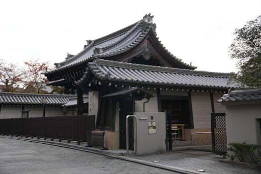 Traditional Japanese temple with intricate roof designs in Kyoto, Japan.