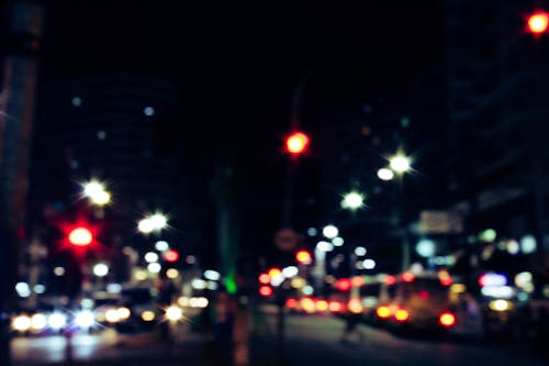 Bokeh Photography of Street Full of Vehicles at Night