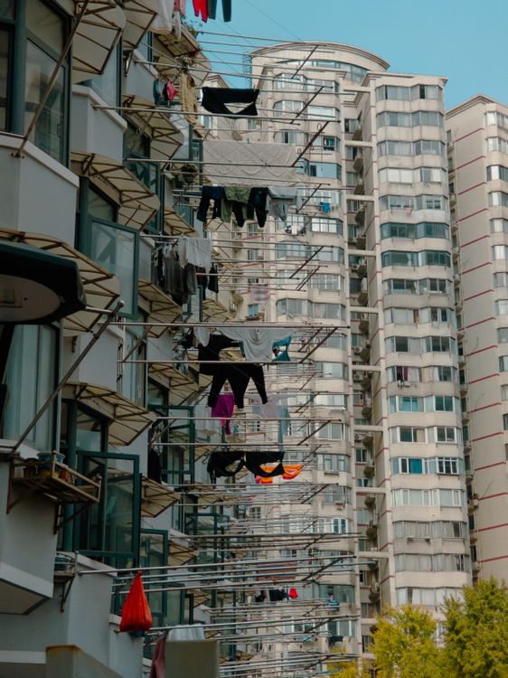 High Rise Daundry Urban Apartment Laundry with High-Rise Background · Free Stock Photo