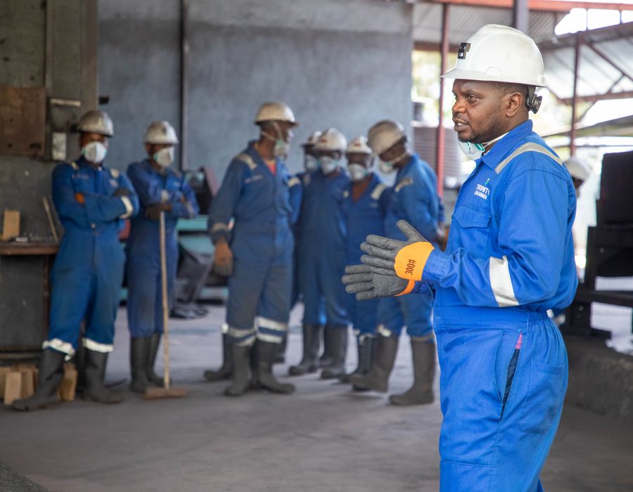Industrial safety training session for workers in protective gear