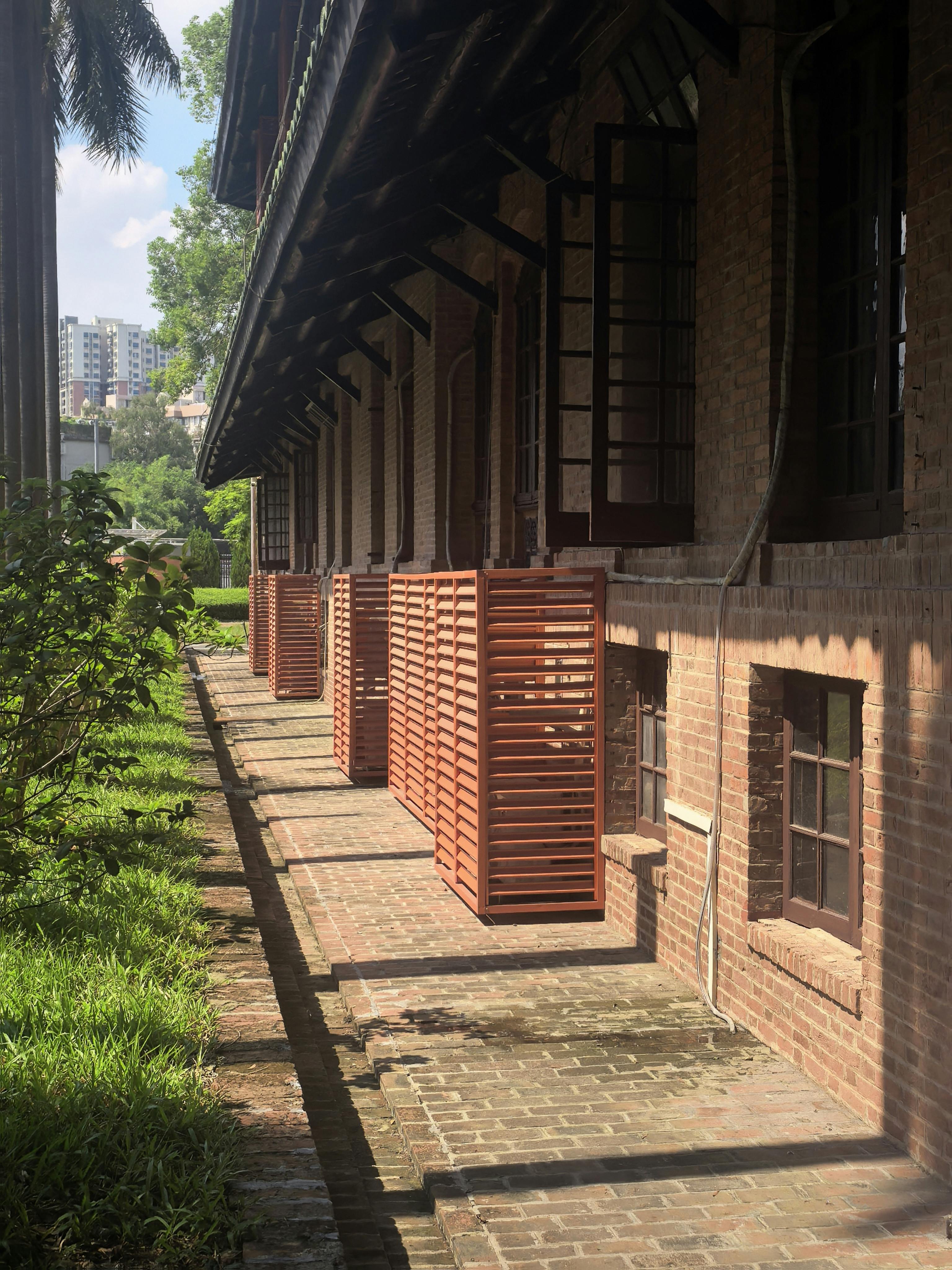 Restored colonial barracks surrounded by tropical trees at Dempsey Hill Singapore