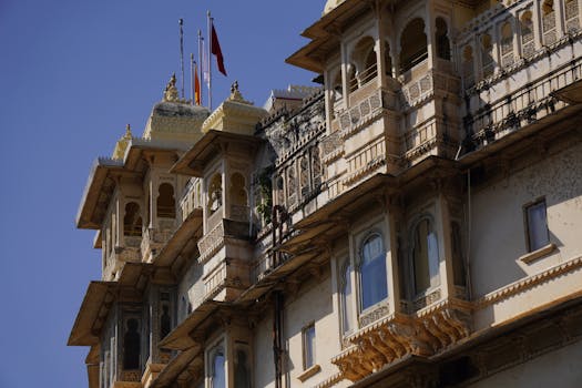 A detailed view of the historic City Palace architectural design in Udaipur, Rajasthan, India.