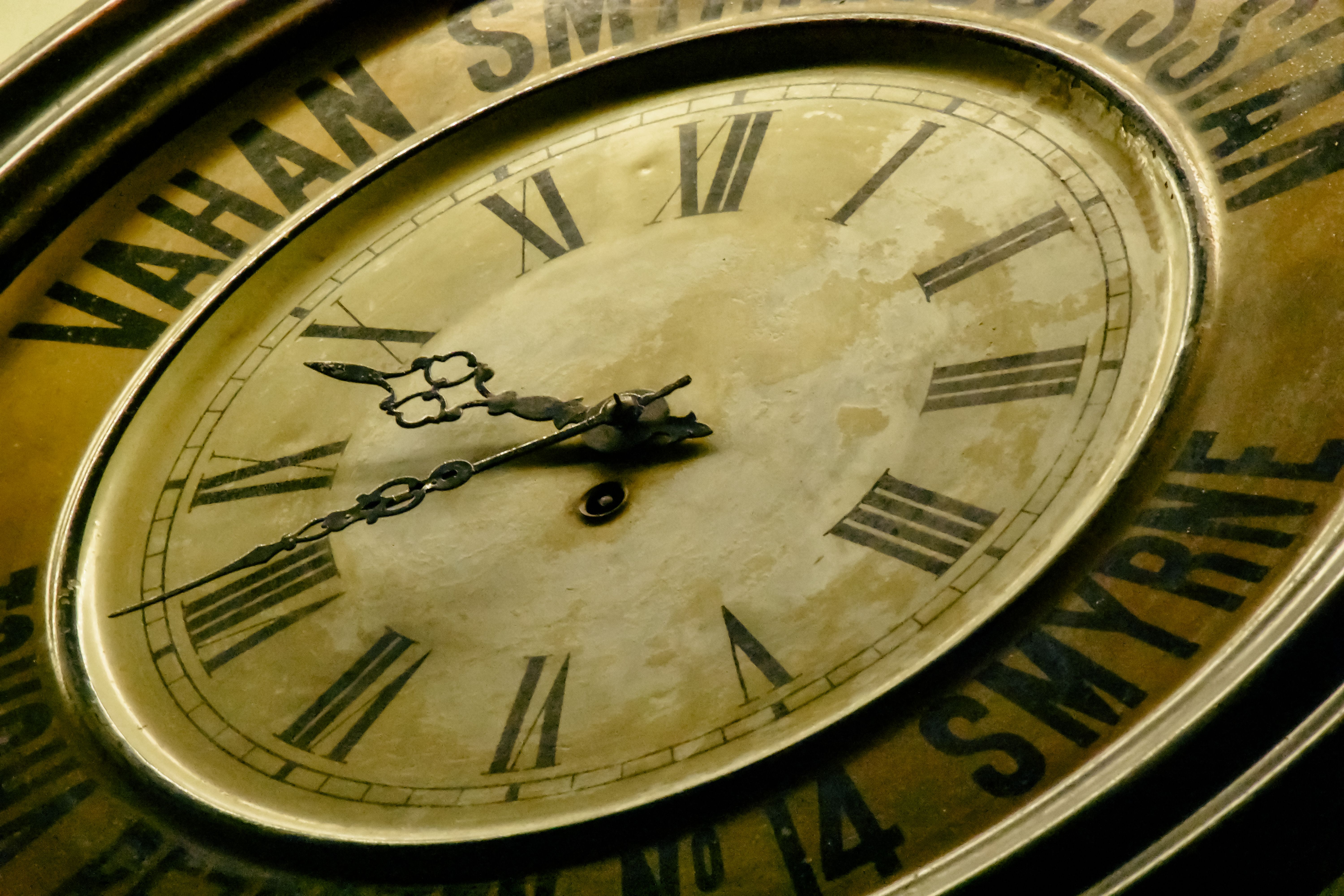 Detailed close-up of an antique clock with Roman numerals in Istanbul, Türkiye.