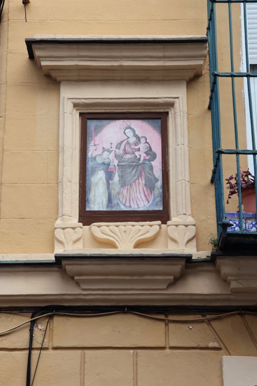 Free Traditional religious painting on building facade in El Puerto de Santa María, Andalucía. Stock Photo