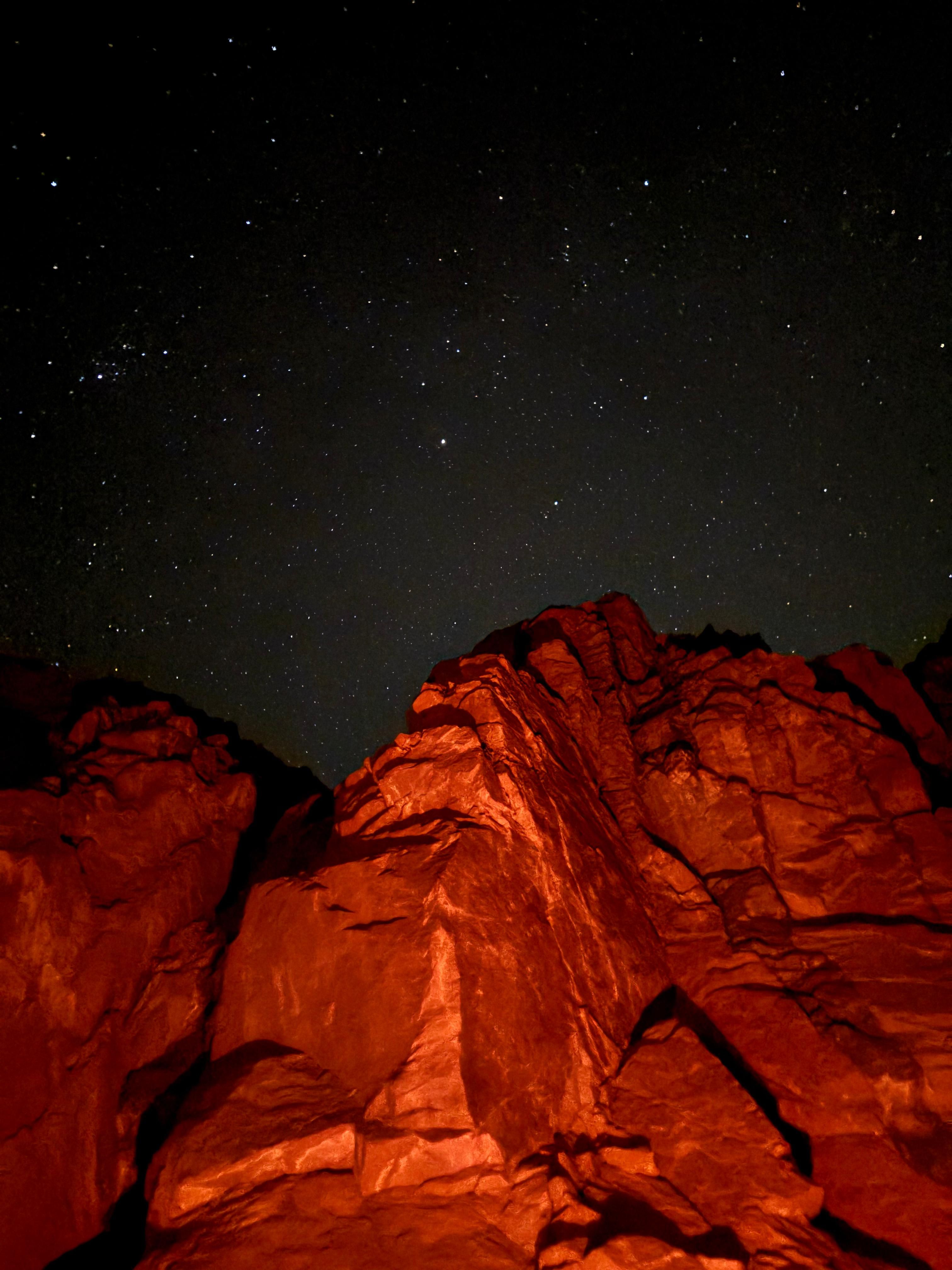 Stunning Night Sky Over Red Rock Formation · Free Stock Photo