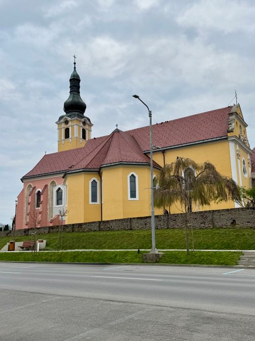 Free Charming historic church with colorful facade located in Našice, Croatia. Stock Photo