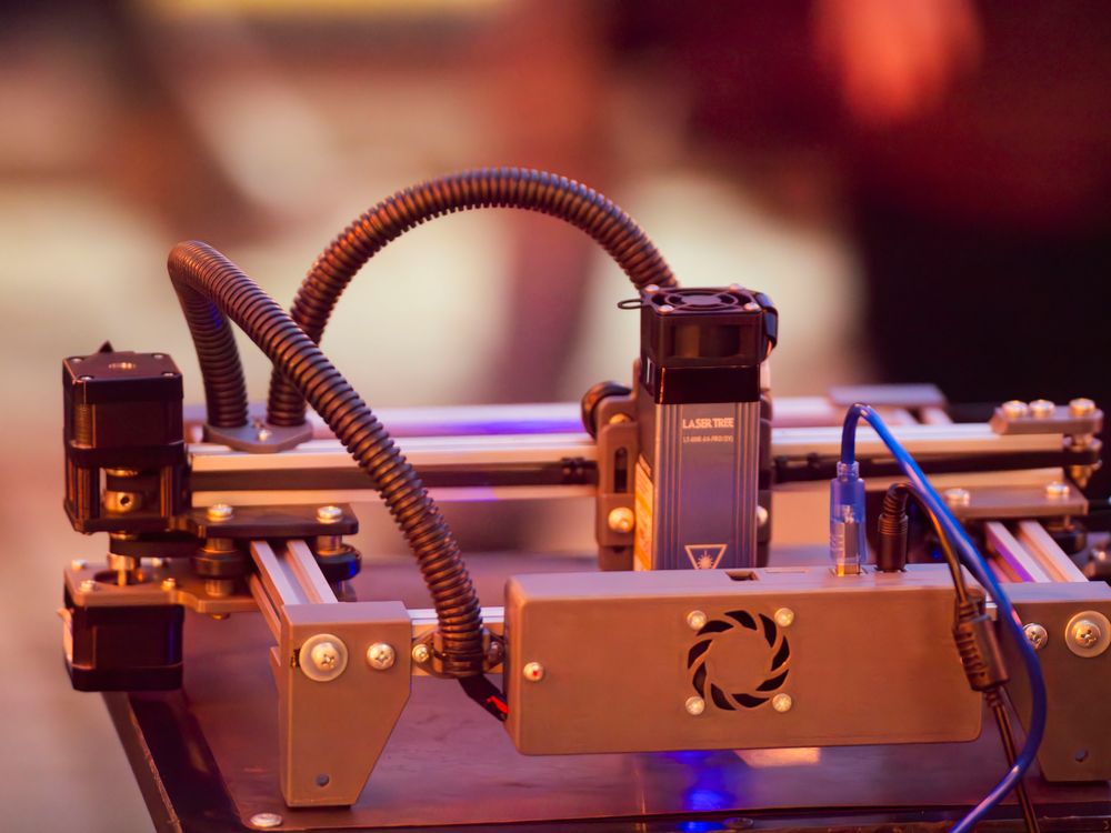 Close-up of a 3D Printer in Action · Free Stock Photo