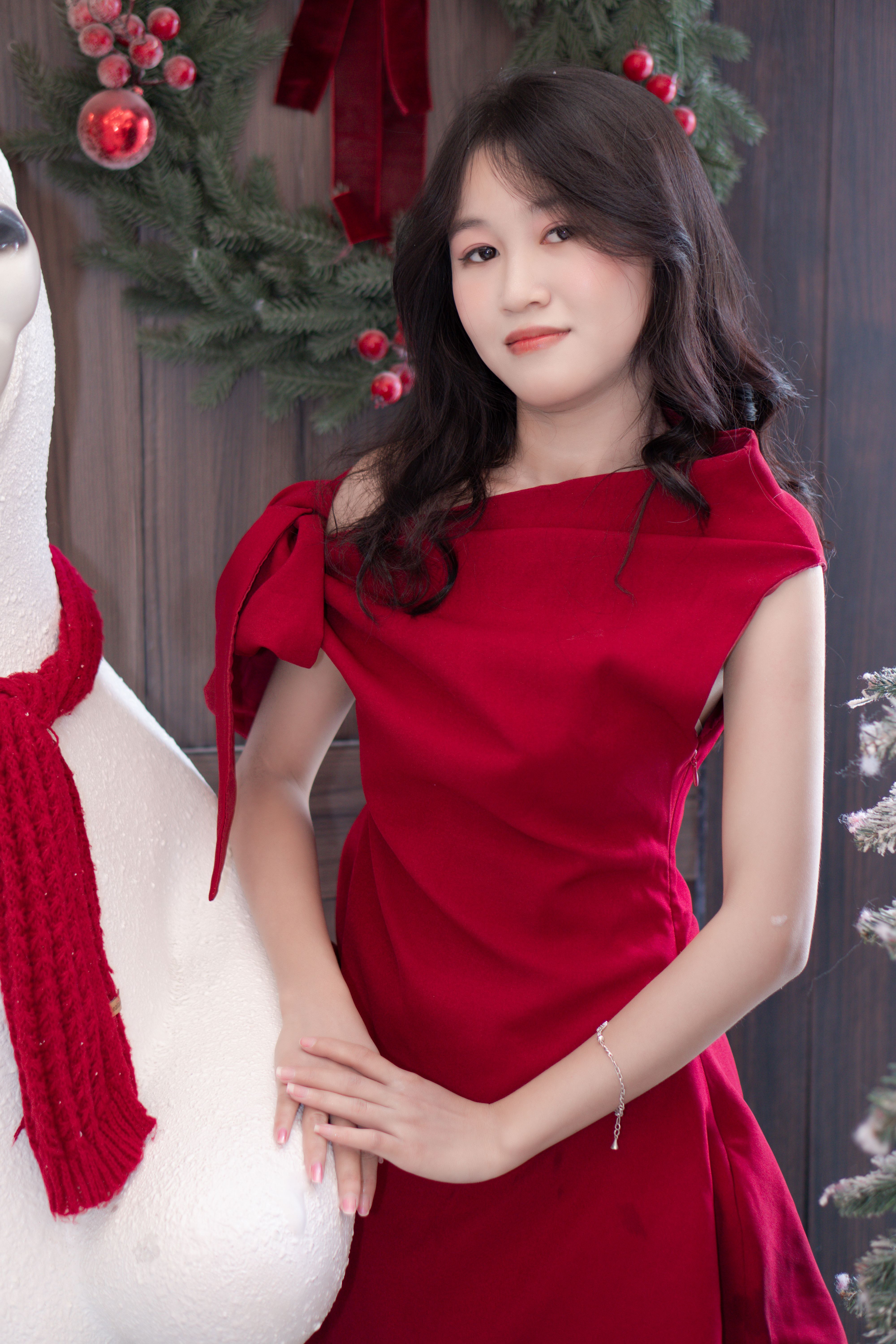 Festive Portrait of a Woman in a Red Dress · Free Stock Photo
