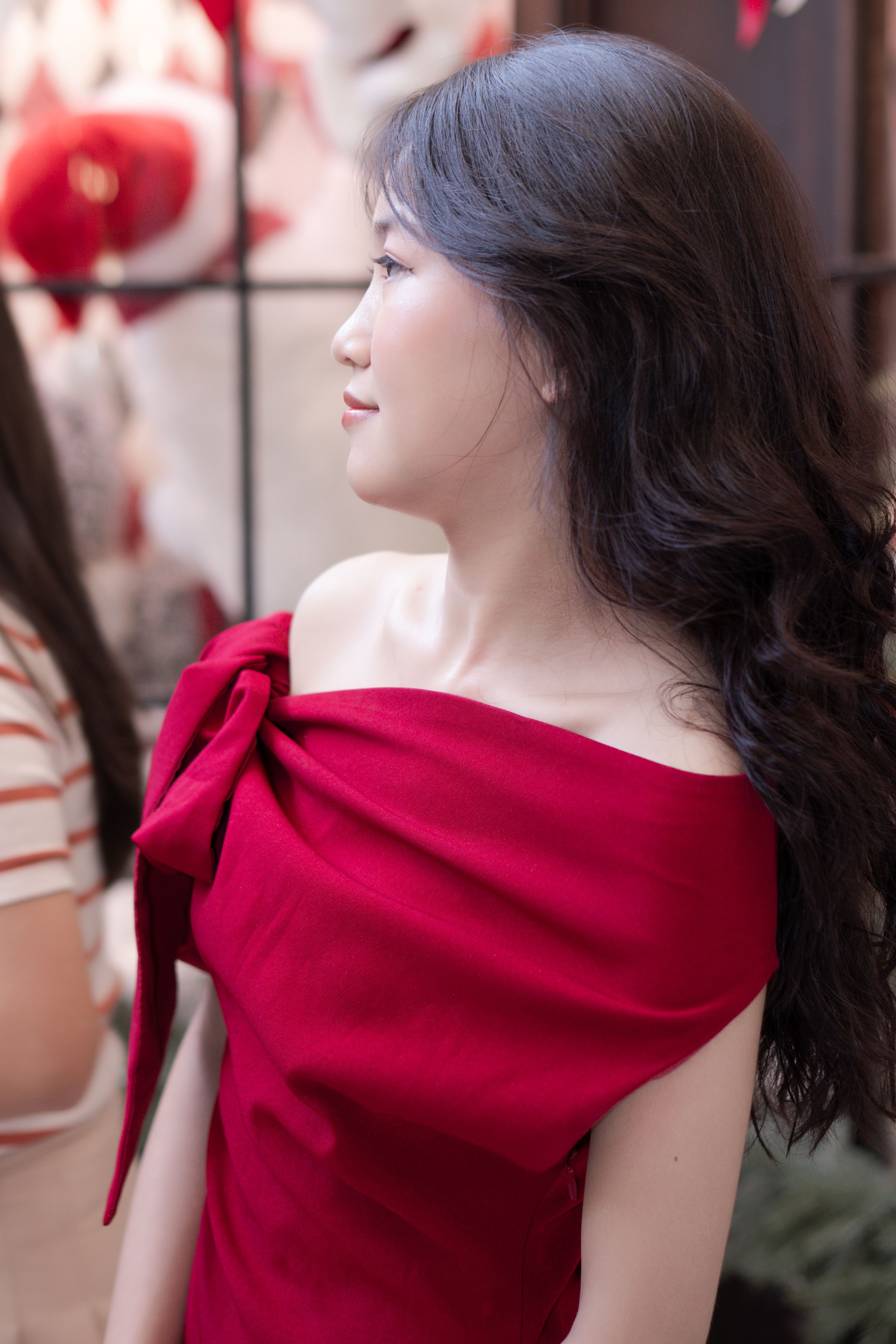 Elegant Woman in Red Dress with Soft Lighting · Free Stock Photo