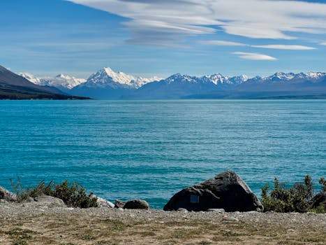 Captivating view of Lake Pukaki with snow-capped Southern Alps in Canterbury, New Zealand.