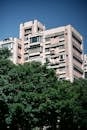 Urban Residential Building with Greenery in View