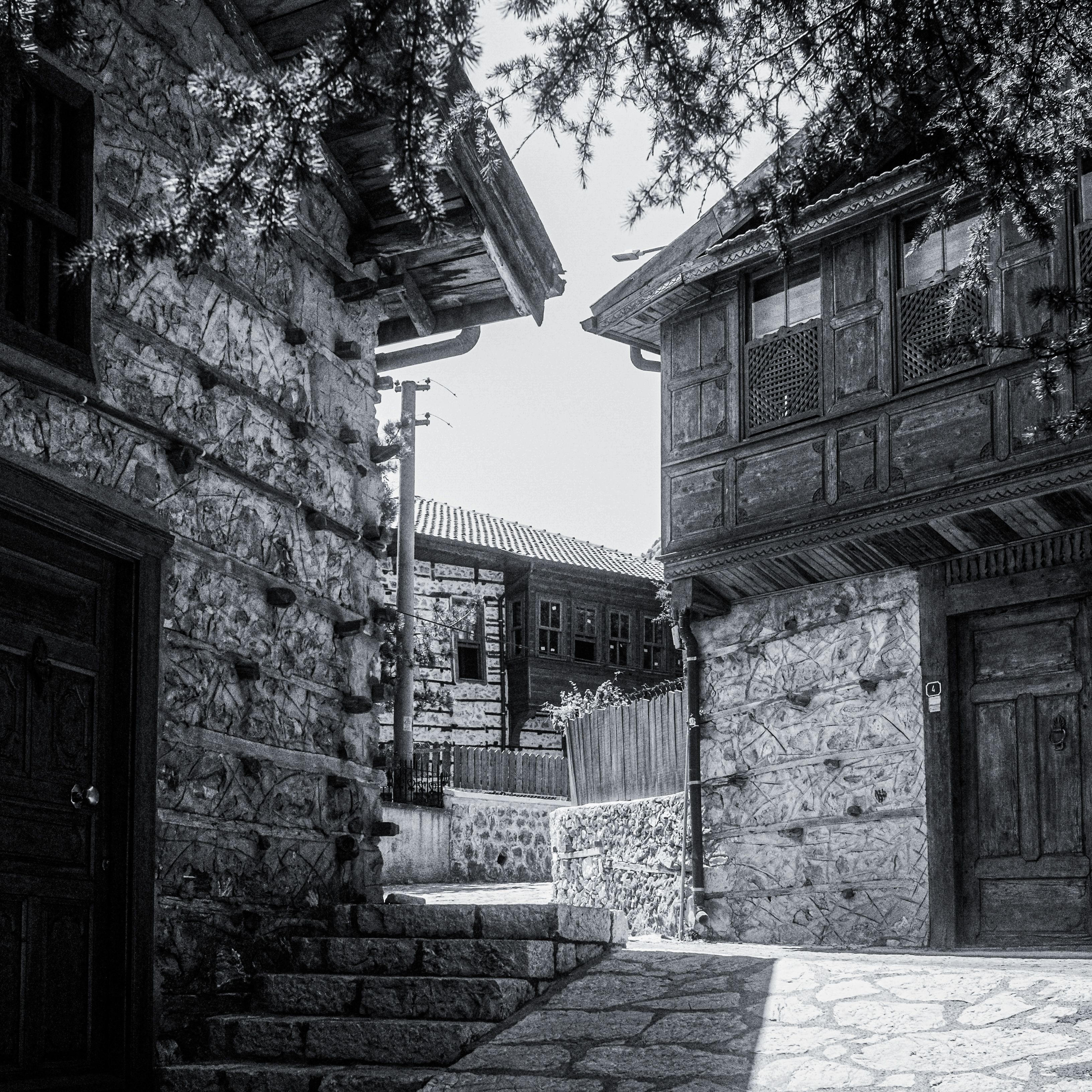 Charming Black and White Historic Village Scene · Free Stock Photo