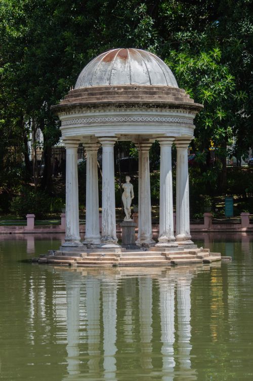 Free Elegant pavilion with columns and dome in park with reflection in water, Minas Gerais. Stock Photo