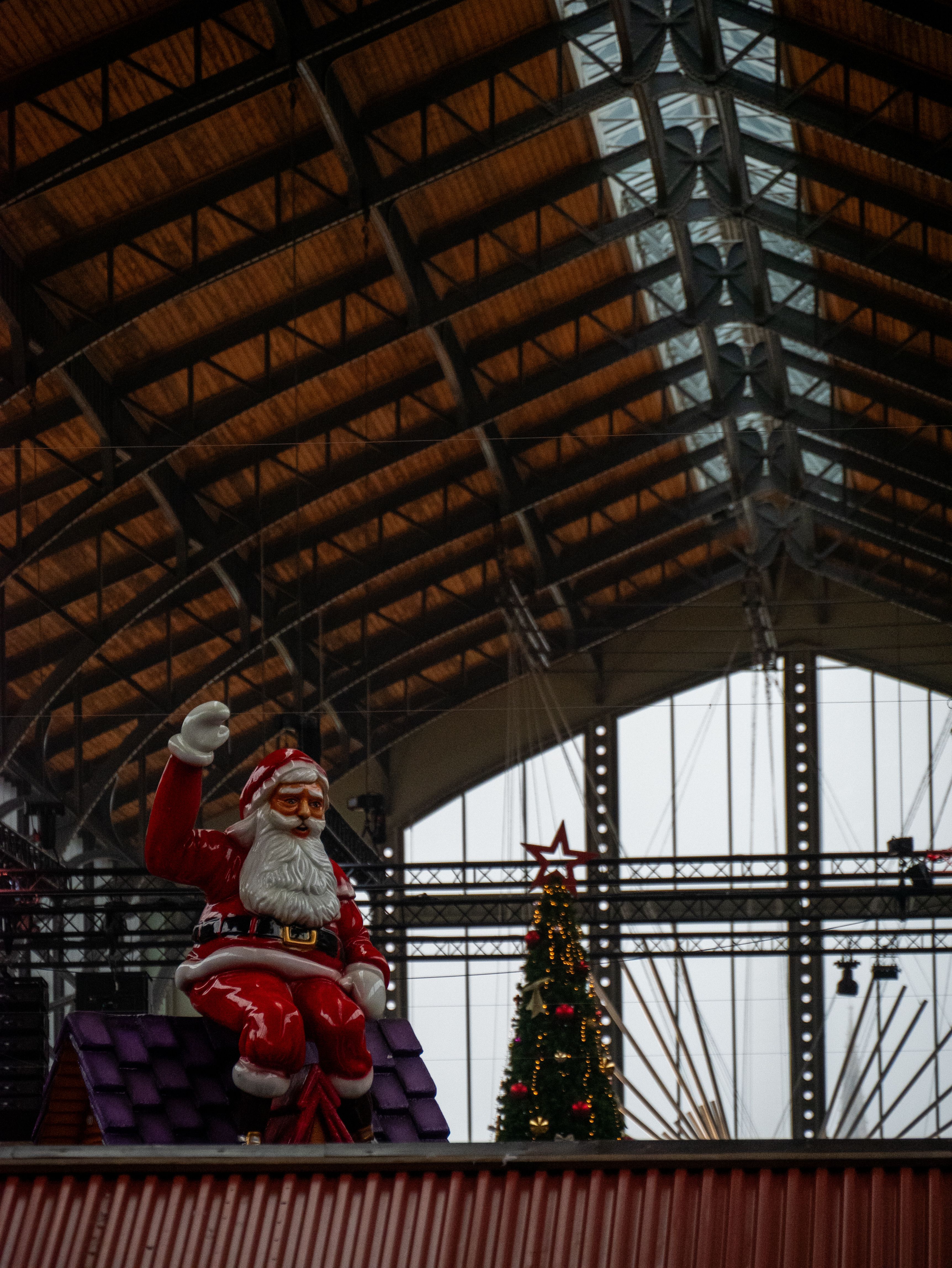 Festive Santa Figure in Architectural Setting · Free Stock Photo