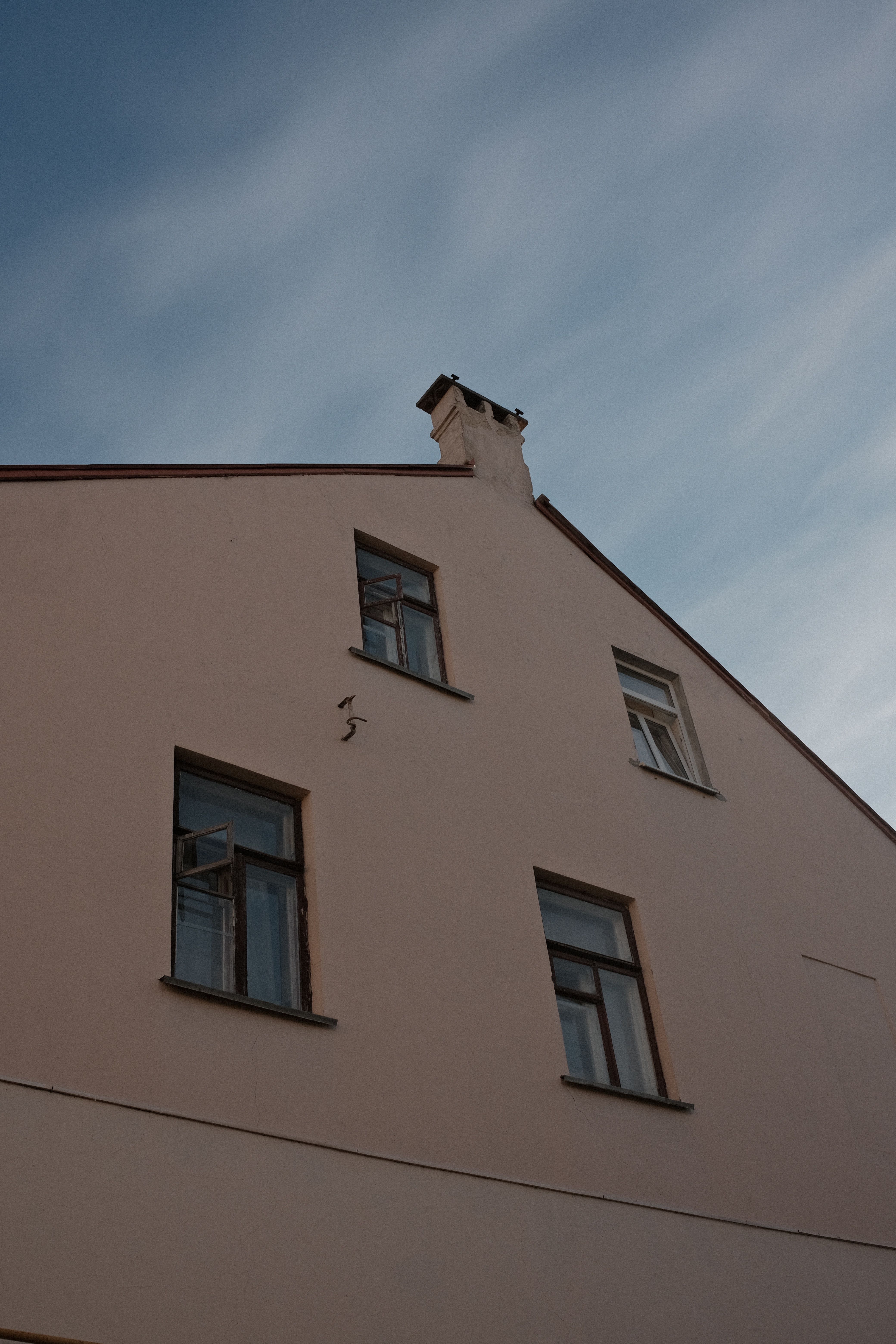 Historic Building Facade Under Blue Sky · Free Stock Photo