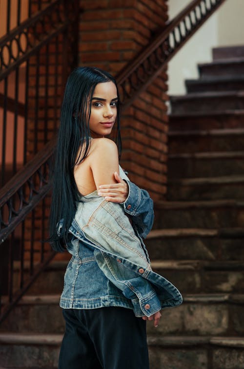 Shallow Focus Photography of Woman Wearing Denim Jacket