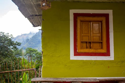 Brightly painted window on a traditional house in Ibagué, Colombia.