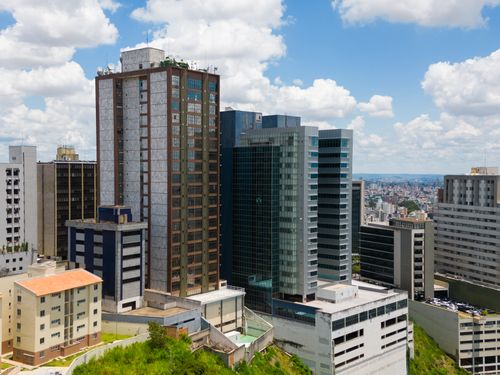 Free Cityscape of Belo Horizonte, Brazil featuring modern skyscrapers under a bright sky. Stock Photo