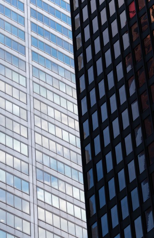 Free Blue glass skyscrapers reflecting the sky, showcasing urban architecture. Stock Photo