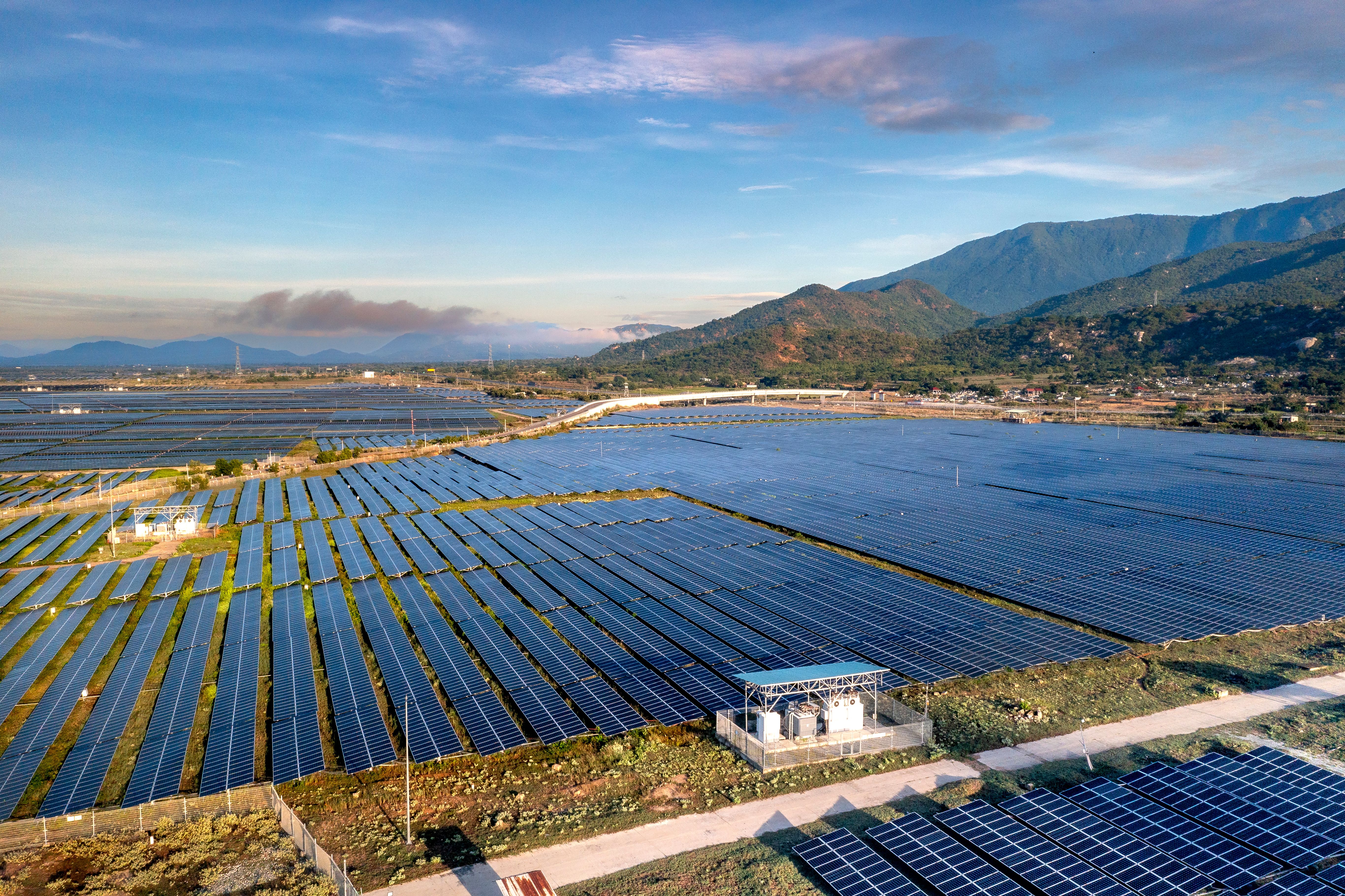 Utility scale solar farm aerial view with dramatic sky