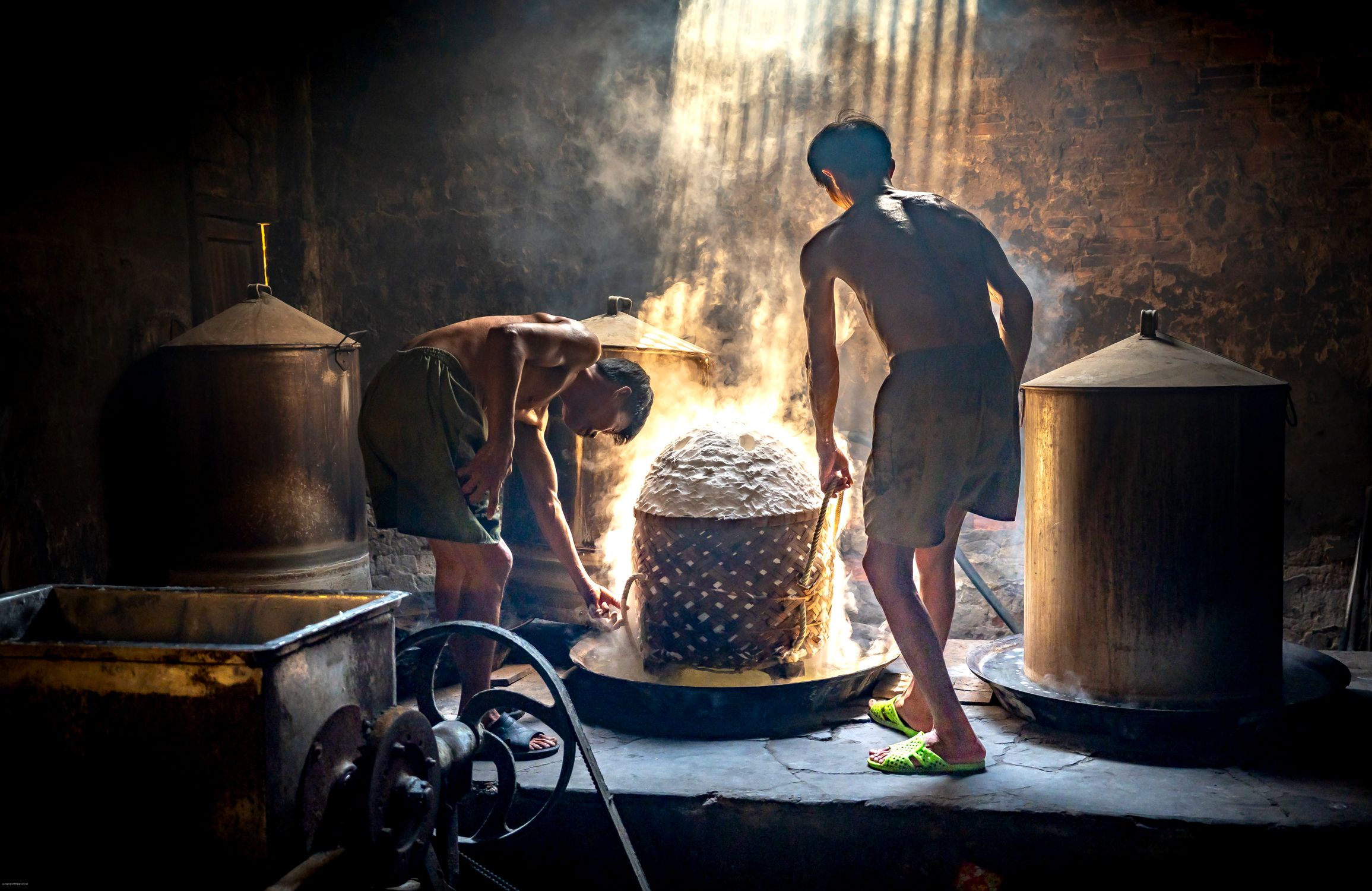 Traditional Brewing Process in Rustic Setting · Free Stock Photo