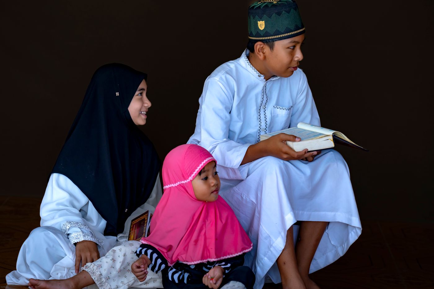 Children reading the Quran together during Islamic learning