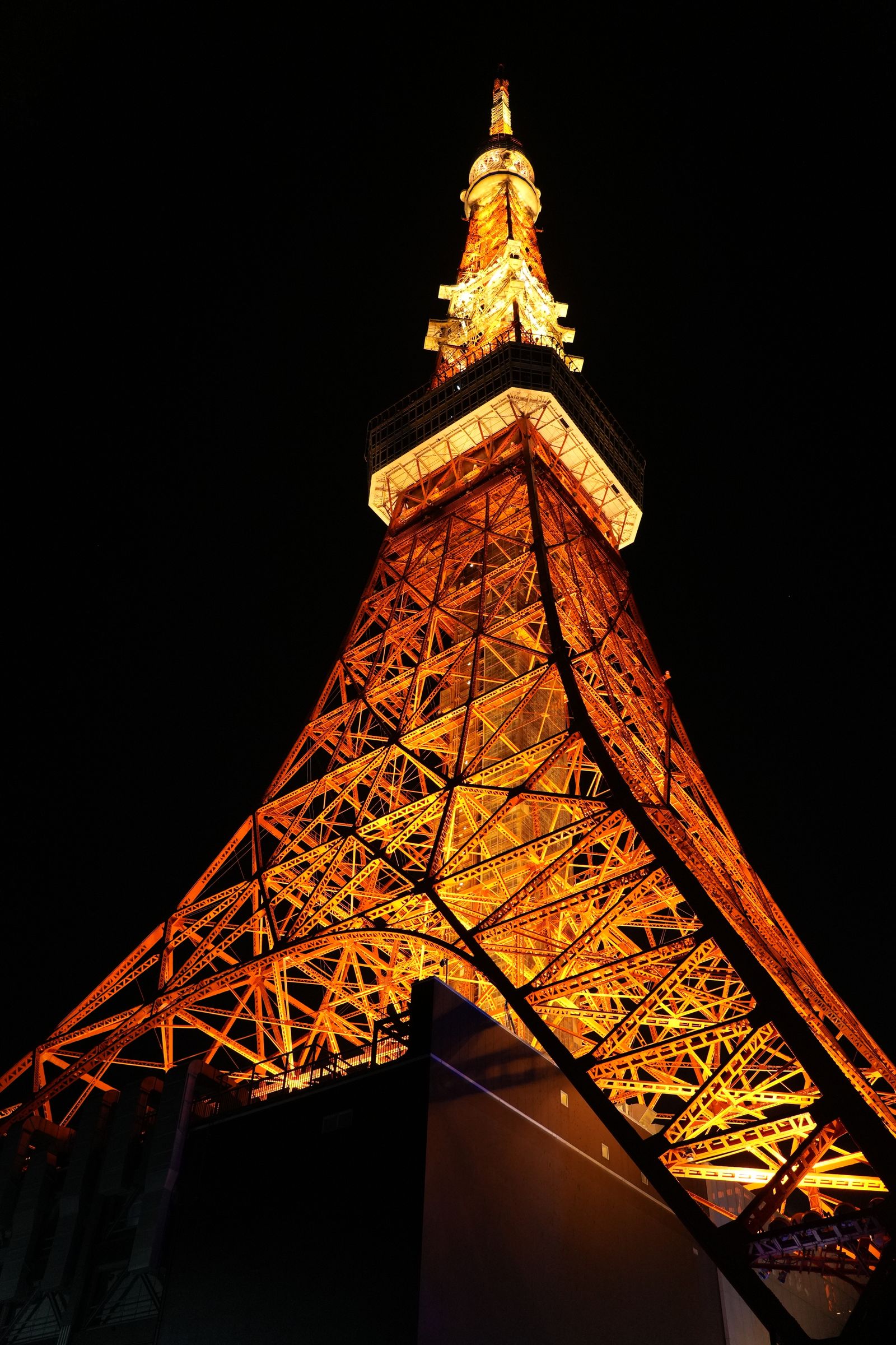 Tokyo Tower Illuminated at Night from Below · Free Stock Photo