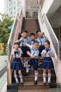 Group of Children Posing on Outdoor Staircase