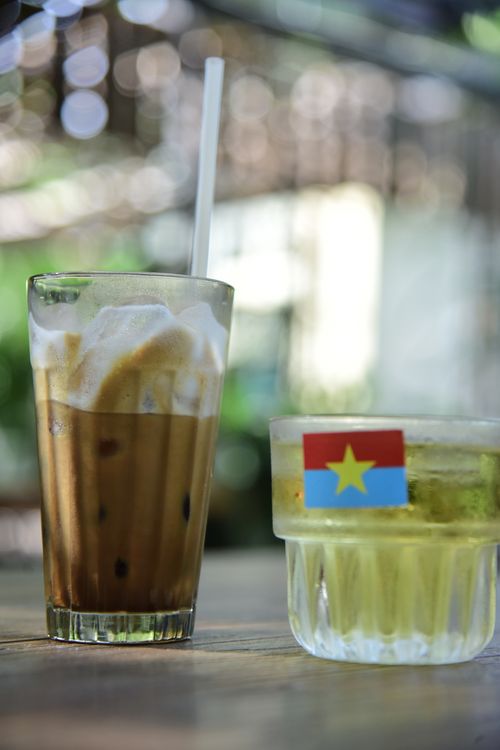 Free Close-up of iced coffee and tea on a table outdoors, perfect for summer refreshment. Stock Photo