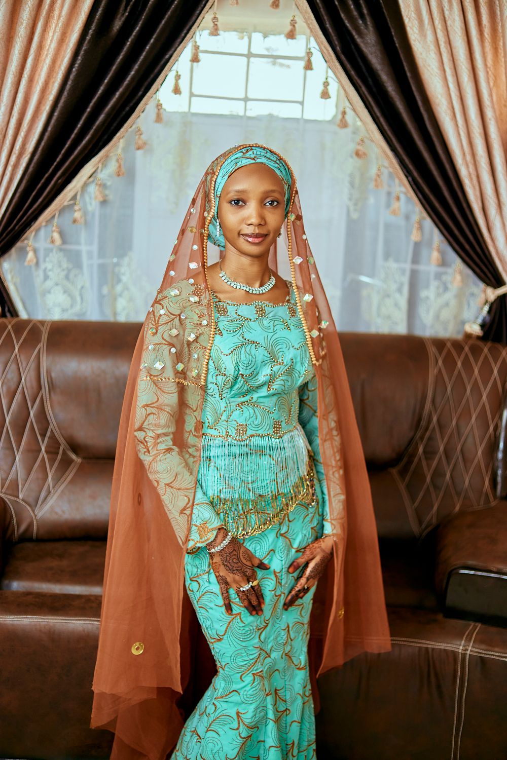 Elegant Woman in Traditional Attire Indoors · Free Stock Photo