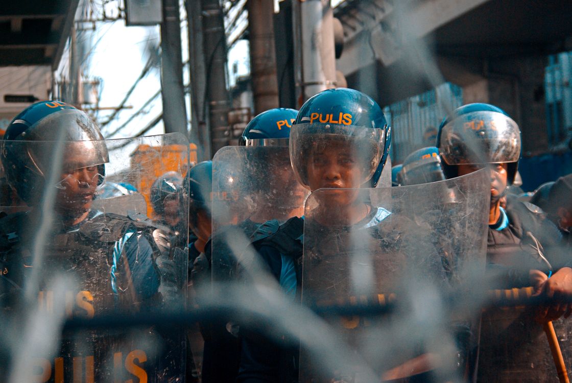 Maximum Security Riot Guard Riot Police Standing Guard in Urban Street · Free Stock Photo