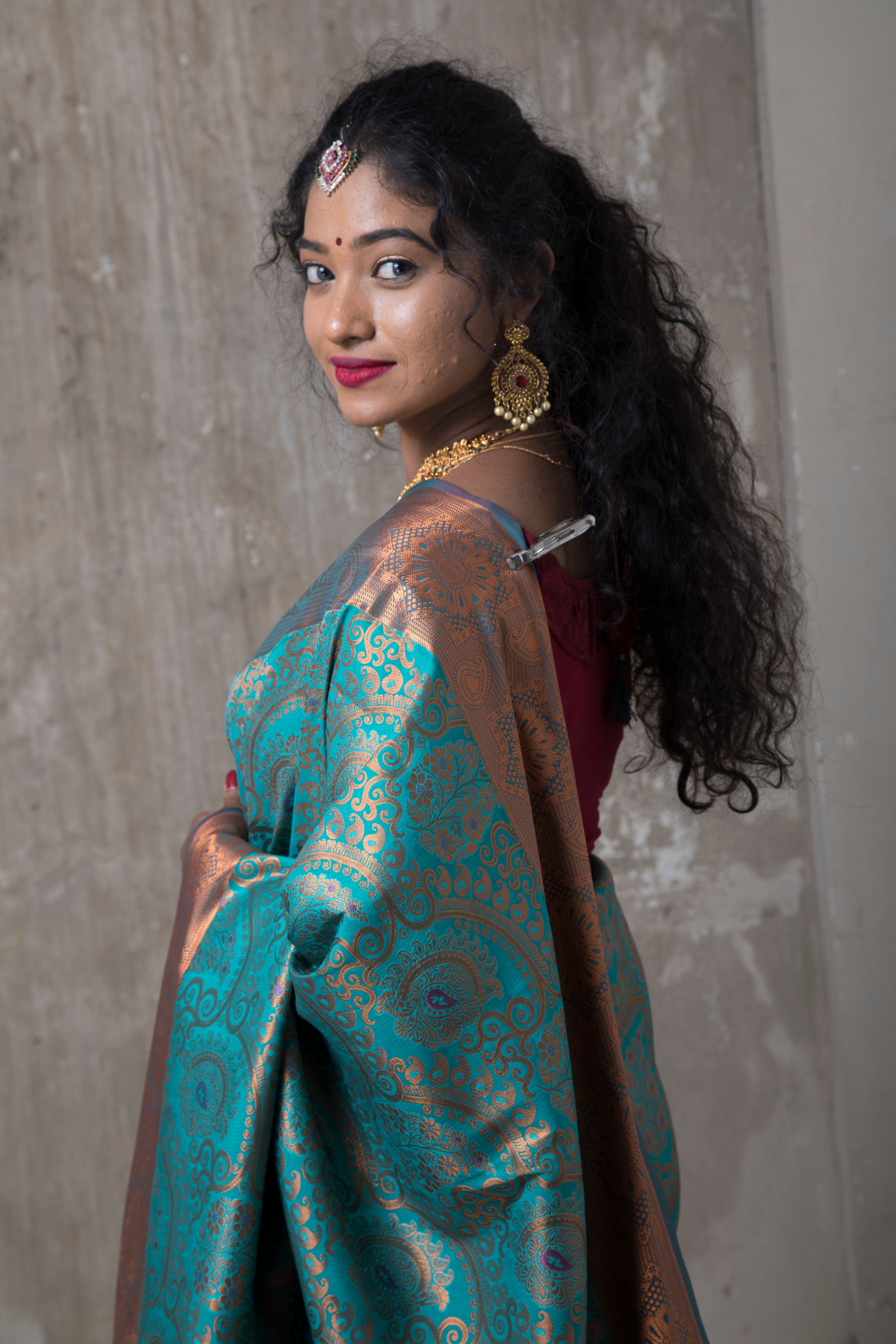 Elegant Woman in Traditional Indian Saree · Free Stock Photo