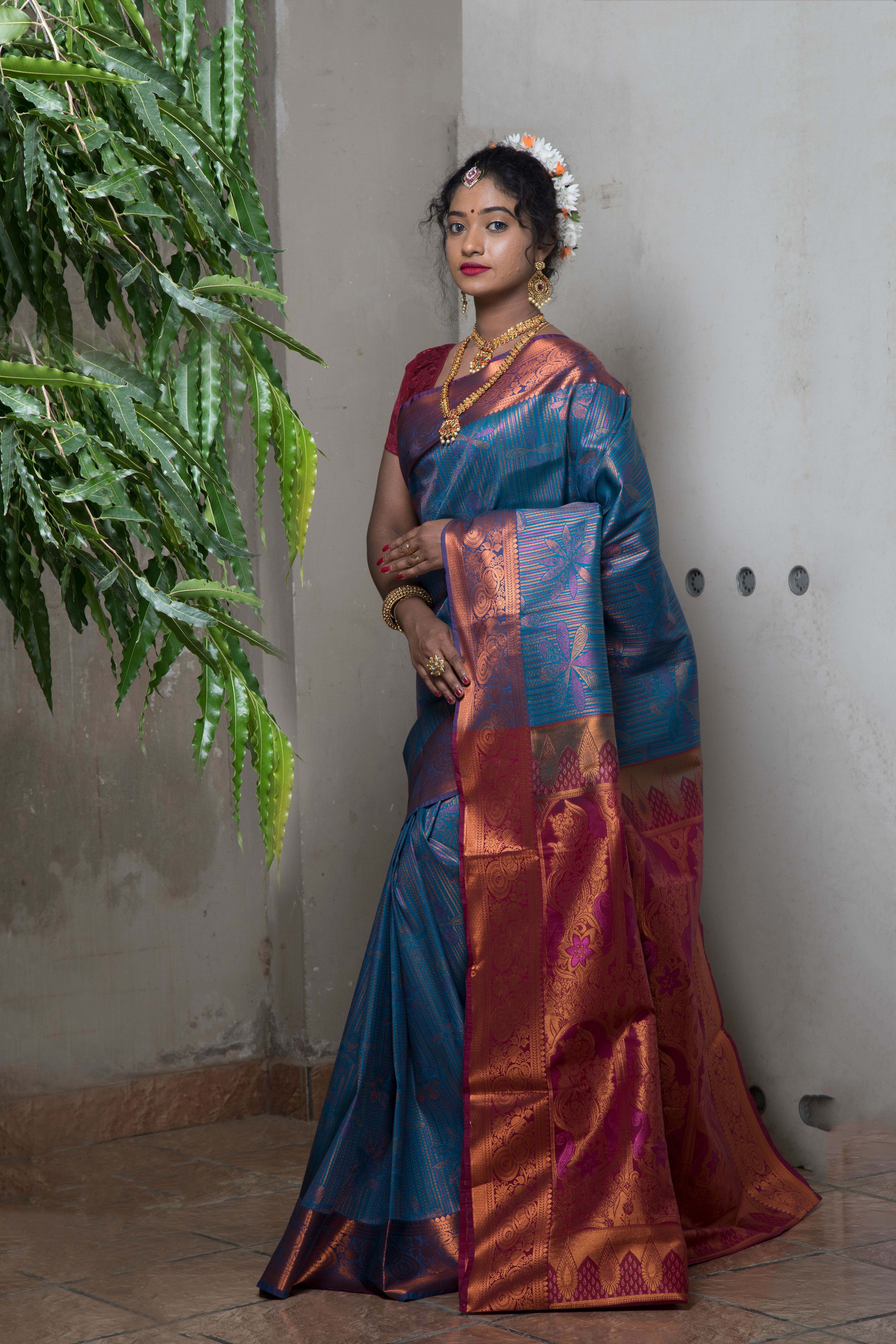 Elegant Woman in Traditional Indian Saree · Free Stock Photo