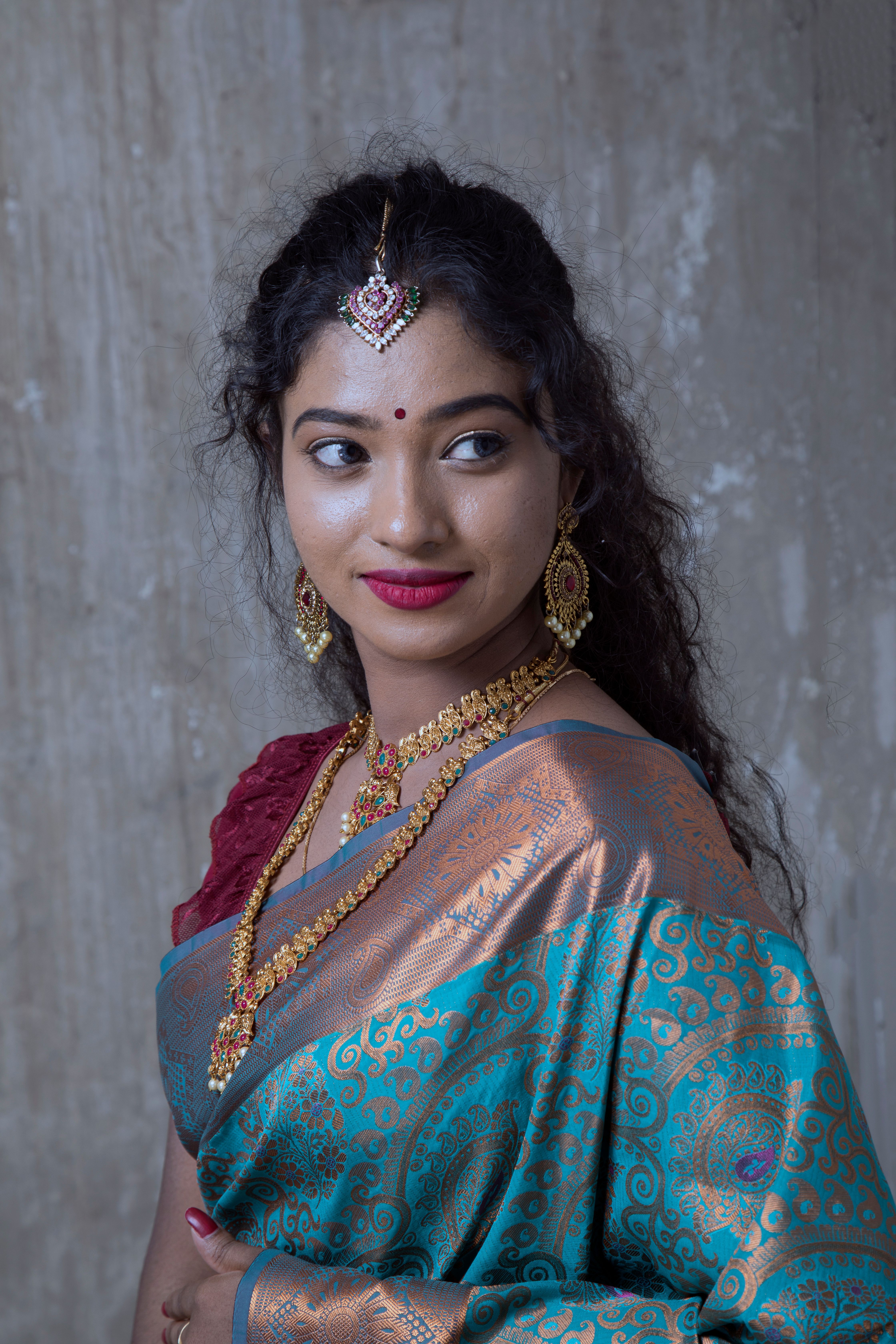Elegant Woman in Traditional Indian Attire · Free Stock Photo