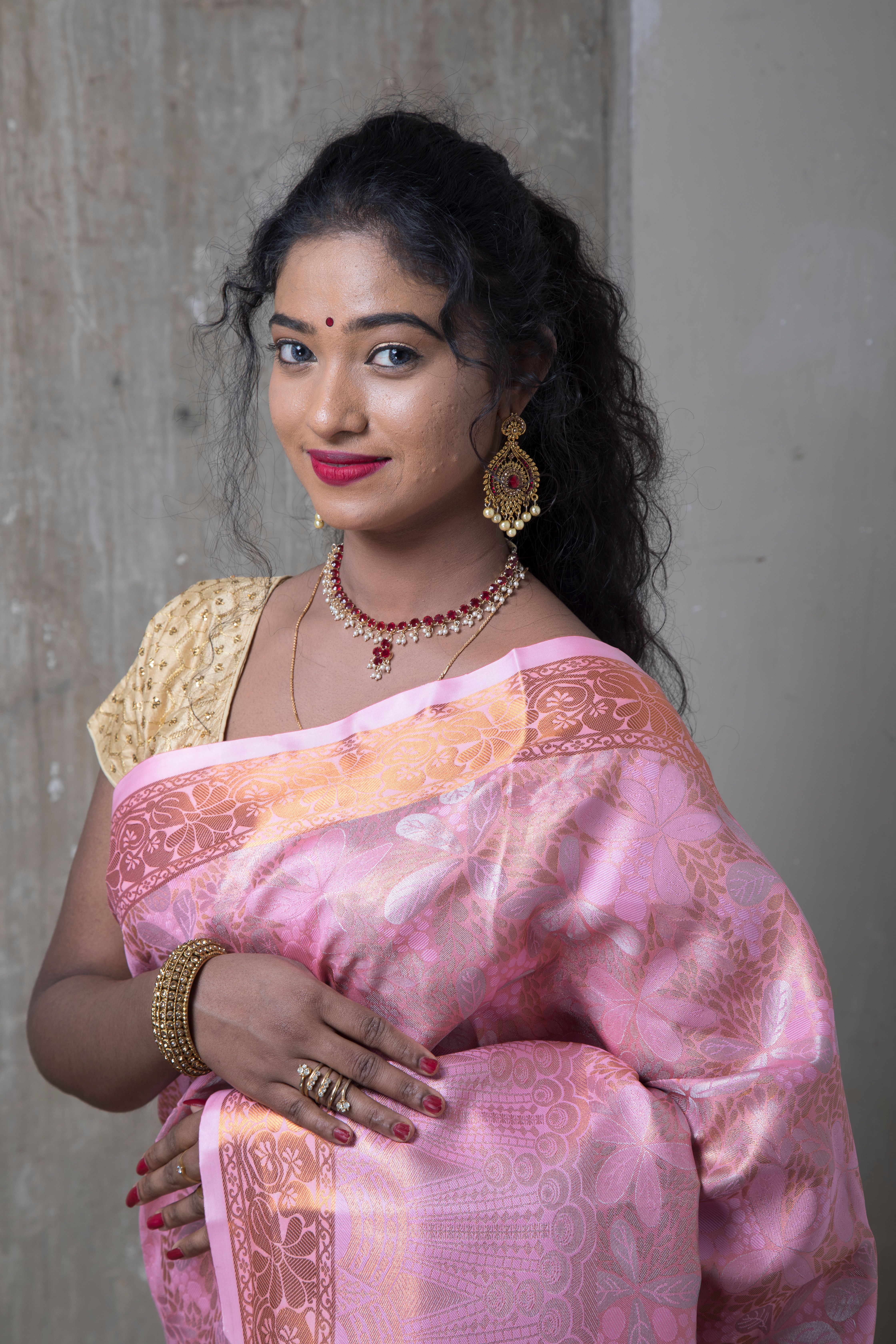 Elegant Woman in Traditional Indian Saree · Free Stock Photo