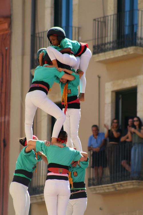 Free A vibrant human tower performance in Tarragona, Spain, showcasing traditional Catalan culture. Stock Photo