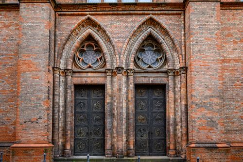 Free Intricate Gothic brickwork with double arch doors in Berlin, Germany. Stock Photo