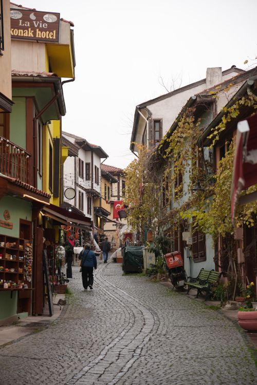 Free Explore the historic cobblestone streets of Odunpazarı in Eskişehir, Türkiye, lined with colorful traditional houses. Stock Photo
