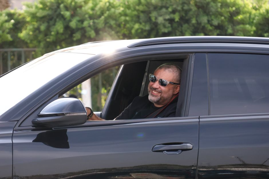 Happy driver on a Pennsylvania road enjoying cheap auto insurance Happy driver on a Pennsylvania road enjoying cheap auto insurance