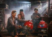 Three Javanese men enjoy bird keeping indoors, showcasing Indonesian culture in West Java.