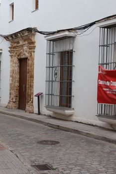 Explore the charming historic streets of Puerto Real, Andalucía, with classic architectural styles.