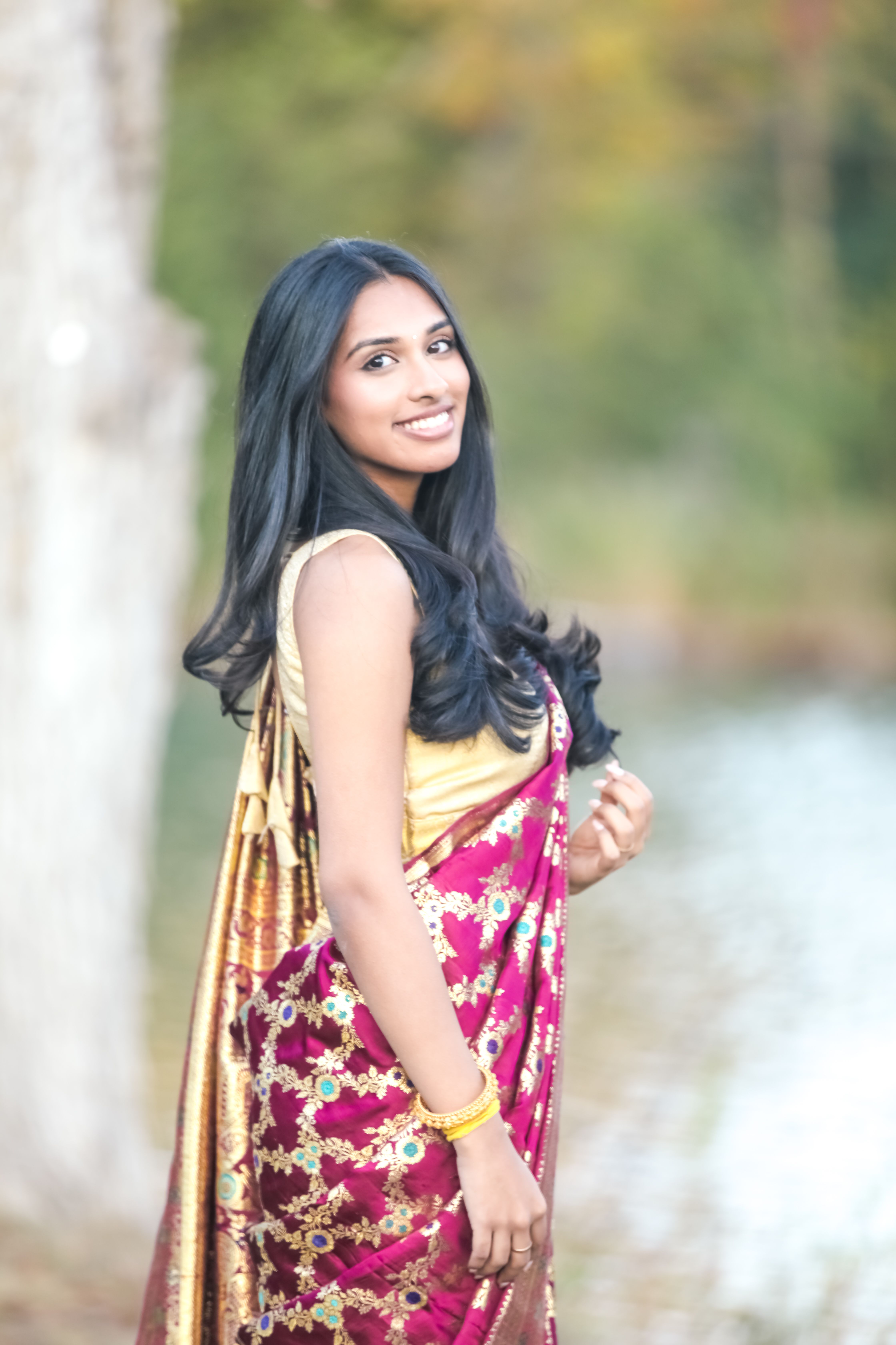 Elegant Woman in Traditional Indian Sari Outdoors · Free Stock Photo