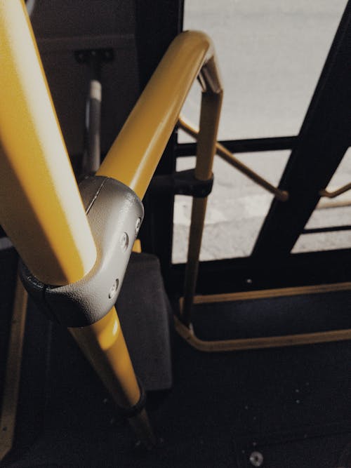 Yellow Handrail Of A Vehicle