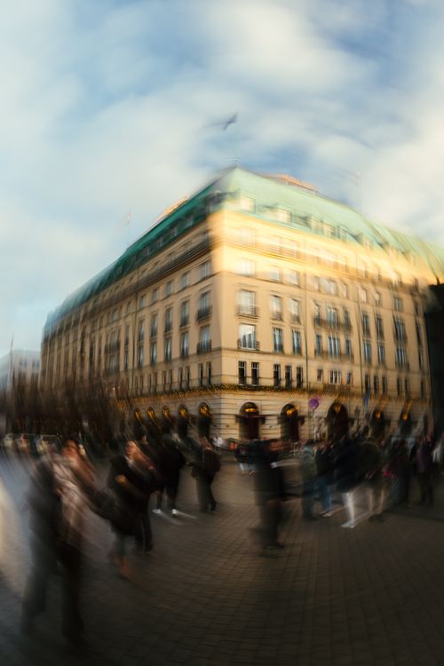 Free Artistic blurred shot of people and historic building in Berlin, Germany. Stock Photo